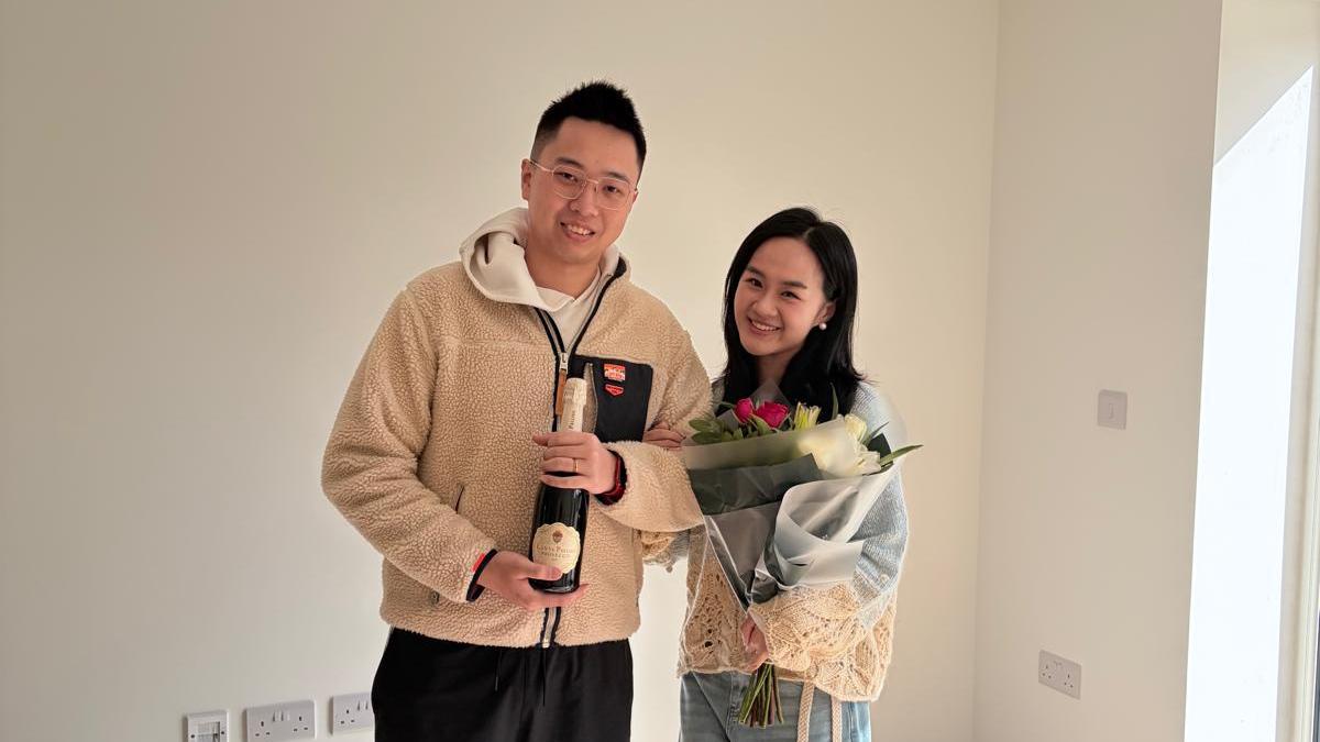 Couple inside their newly built home at Blossom Way, sharing their experience with Dion Homes.
