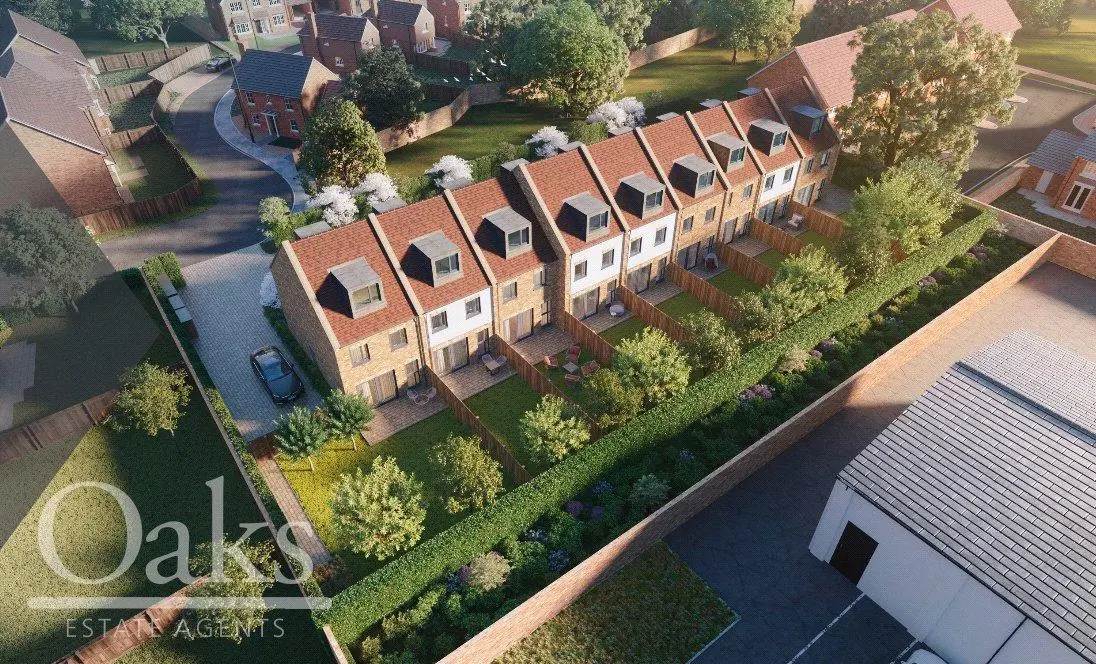 Aerial view of Byards Croft development showing modern terraced homes with private gardens, Dion Homes.